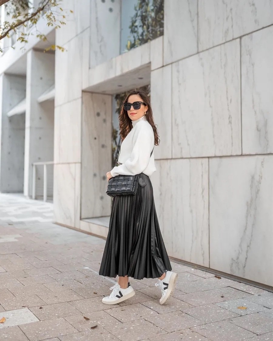 Fall outfit inspo! Pairing this black faux leather pleated skirt with a cozy white sweater and my go-to white sneakers.

fall fashion, transitional outfit, casual chic look, petite fashion, modest look, neutral look

#LTKootd #LTKPetite #LTKU