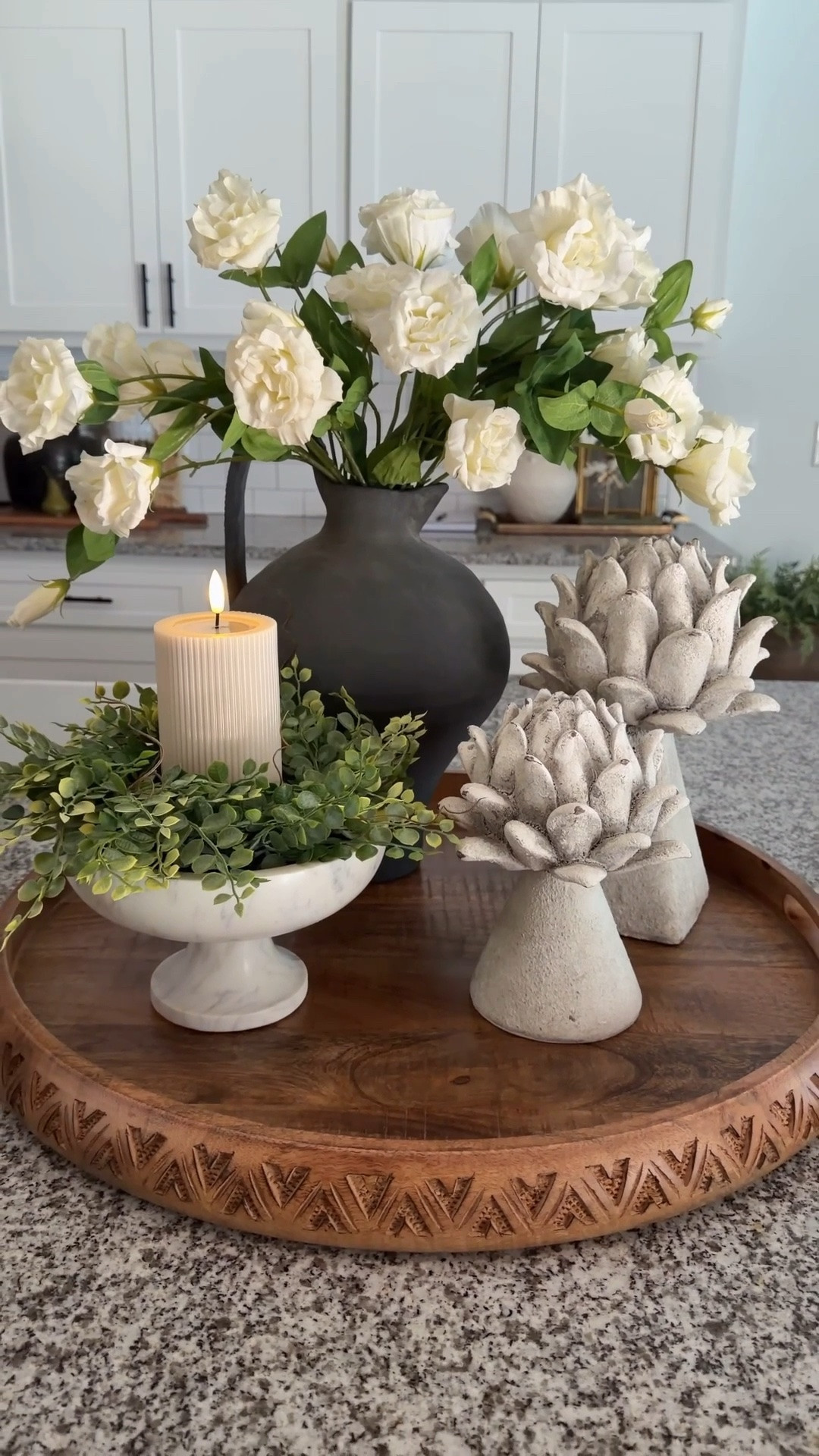 I definitely have Summer on my mind! These real touch roses are absolutely beautiful and add the perfect soft, seasonal touch. And these artichokes? They are stunning and bring so much texture and interest to the arrangement. I paired everything with a marble bowl, a candle ring, and a flameless candle to complete the look. It’s such an easy centerpiece that feels fresh, elegant, and ready for the Summer season.