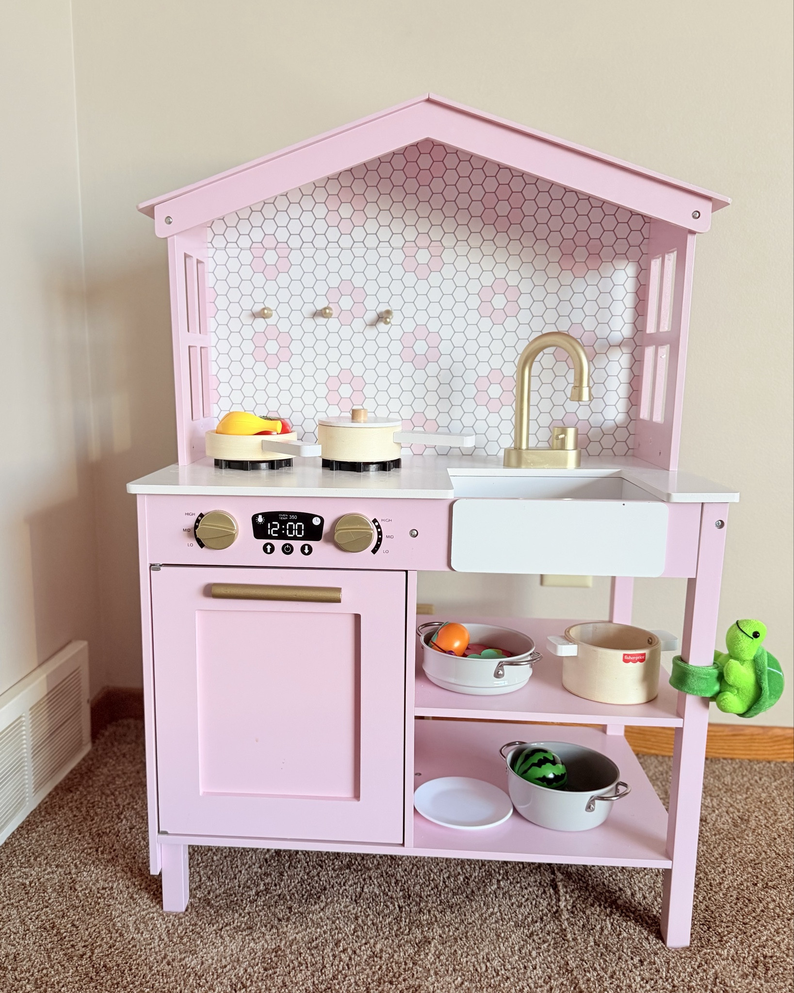 The cutest little kitchen. Perfect height for my 2 year old. The food sets come with pots, pans, and utensils and some pretend food but not a million pieces. It’s just enough! 

#Playkitchen #pretendplay #toddlerroom #toddlertoys #fisherprice 

#LTKKids #LTKmomlife #LTKSaleAlert
