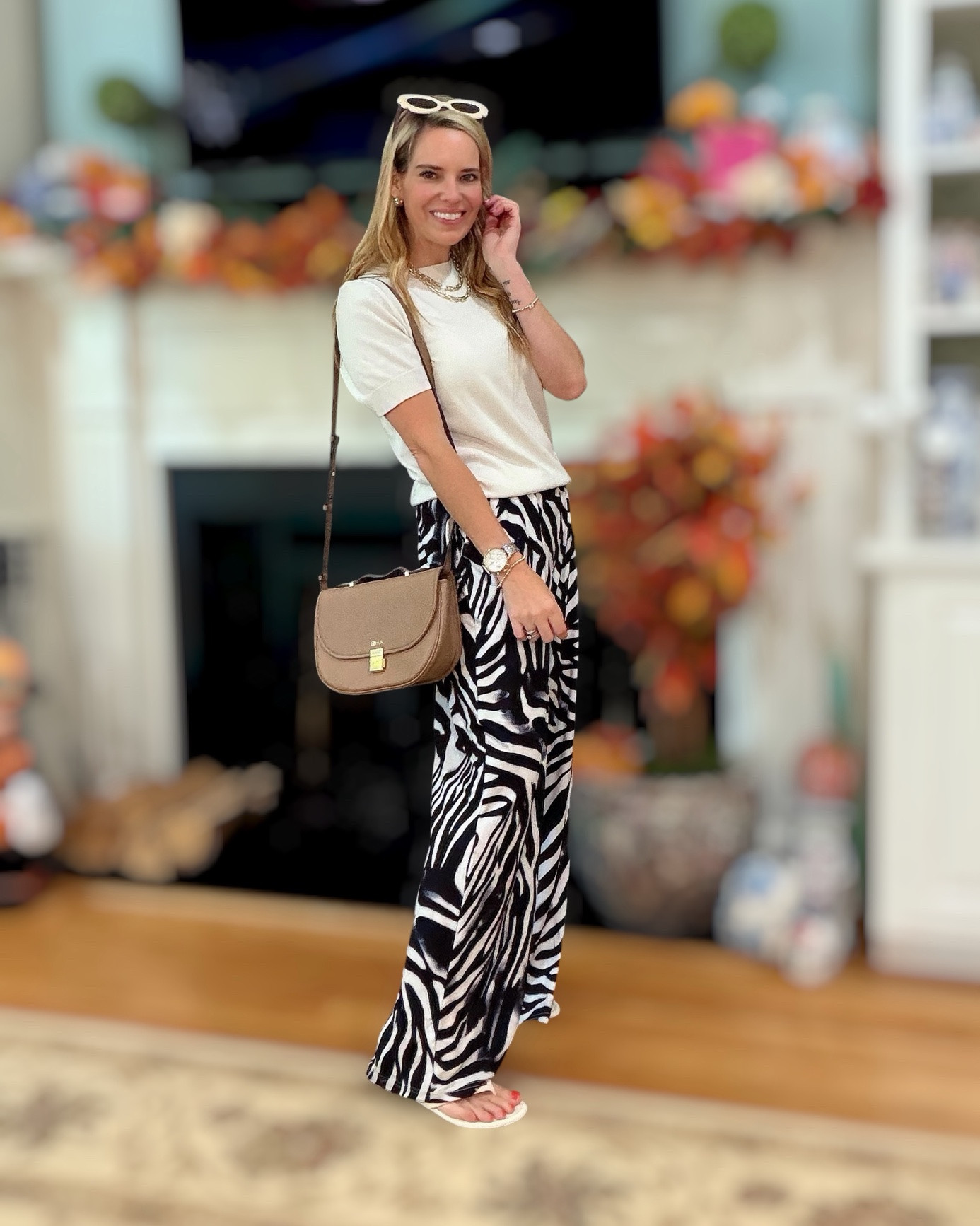 Zebra Print Pants + Cream Knit 🤍🖤🐆

A little neutral moment with a bold twist! These zebra print pants are such a fun statement piece, and I love balancing them with a simple cream knit top and neutral crossbody. Add statement sunglasses and a few layered necklaces for an easy, polished look with a little personality. ✨🤎

The perfect fall transition outfit for brunch, shopping, date nights, or a casual day out. Zebra print pants, animal print fashion, cream knit top, neutral crossbody bag, statement sunglasses, women’s fashion over 40, chic casual outfit, preppy style, elevated everyday style.

#LTKOver40 #LTKSeasonal #LTKPetite