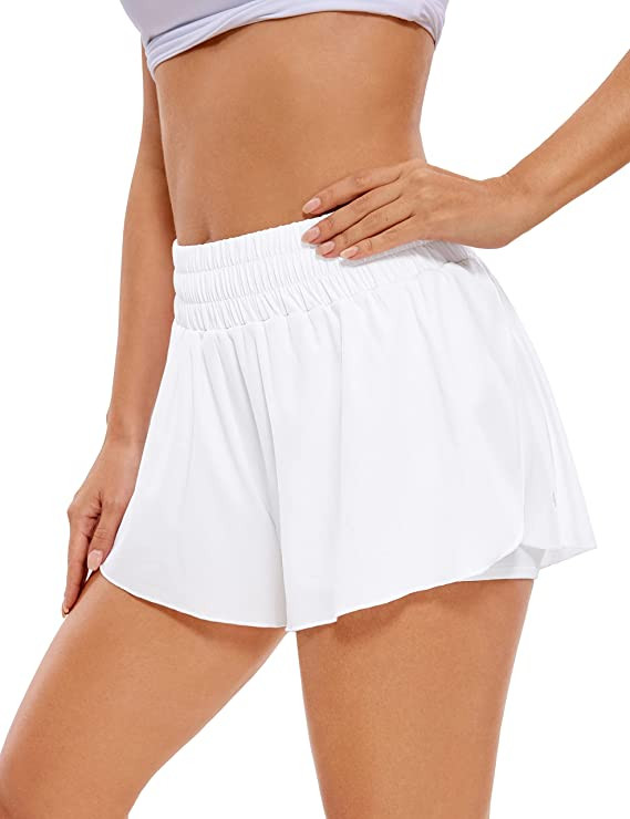 CRZ YOGA 2 in 1 Flowy Running Shorts for Women High Waisted Quick Dry Athletic Gym Lounge Workout... | Amazon (US)