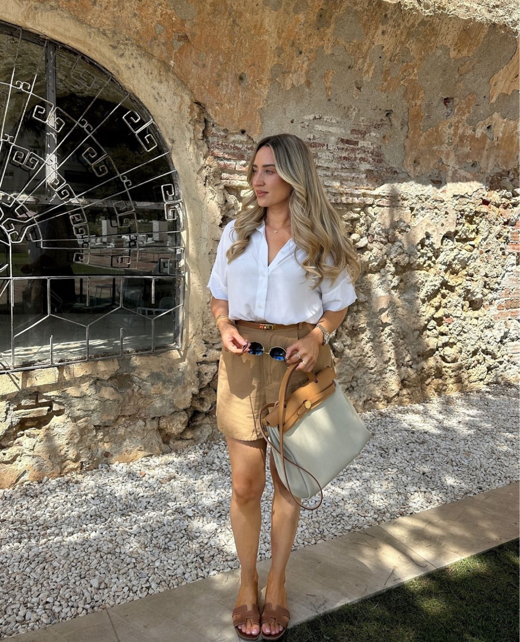 Who doesn’t love a shirt and tailored shorts combo 🤍 neutral summer holiday outfit with my new favourite Hermes! 

#LTKeurope #LTKsummer #LTKluxury