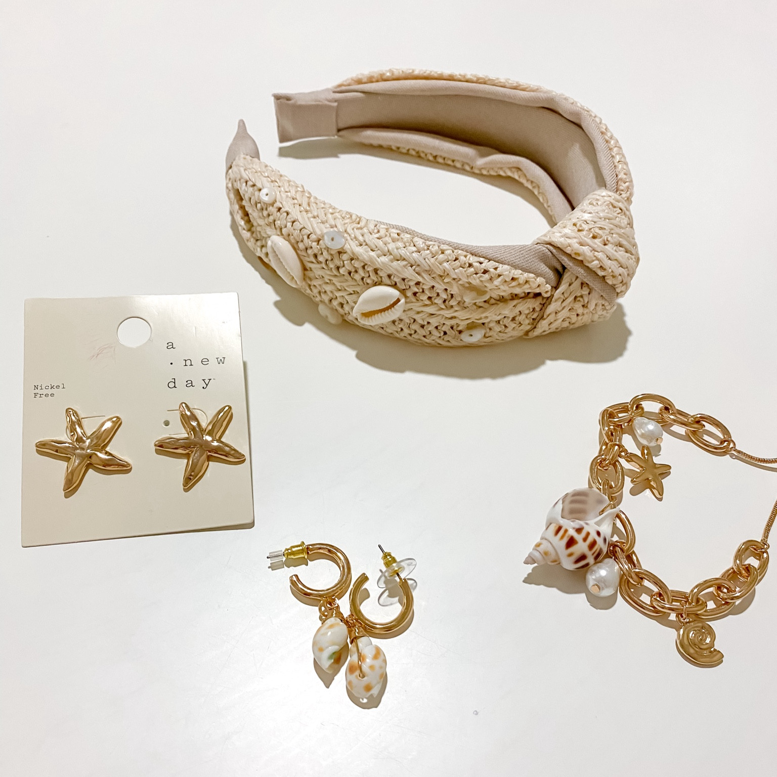 Beach accessories 
Vacation accessories 
Headband 
Gold jewelry
Seashell
Beach, jewelry 
vacation jewelry 
Target sale
Sale alert 
Target jewelry 
Shell jewelry 
shell headband 
Hair accessory 
earrings 
bracelet 
Resortwear 

#LTKFindsUnder50 #LTKSaleAlert #LTKTravel