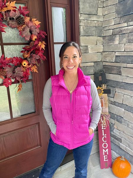 Pop of pink, but comes in a ton of color options, this cozy down puffer vest is so easy to throw on over any tee and really keeps you warm! 