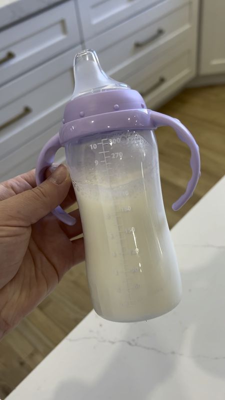Our new favorite transition bottle to training cup. Recommended for 8+ months. It holds 10 oz and has a smaller flatter silicone nipple just like a sippy cup. 

#LTKkids #LTKbaby #LTKfamily