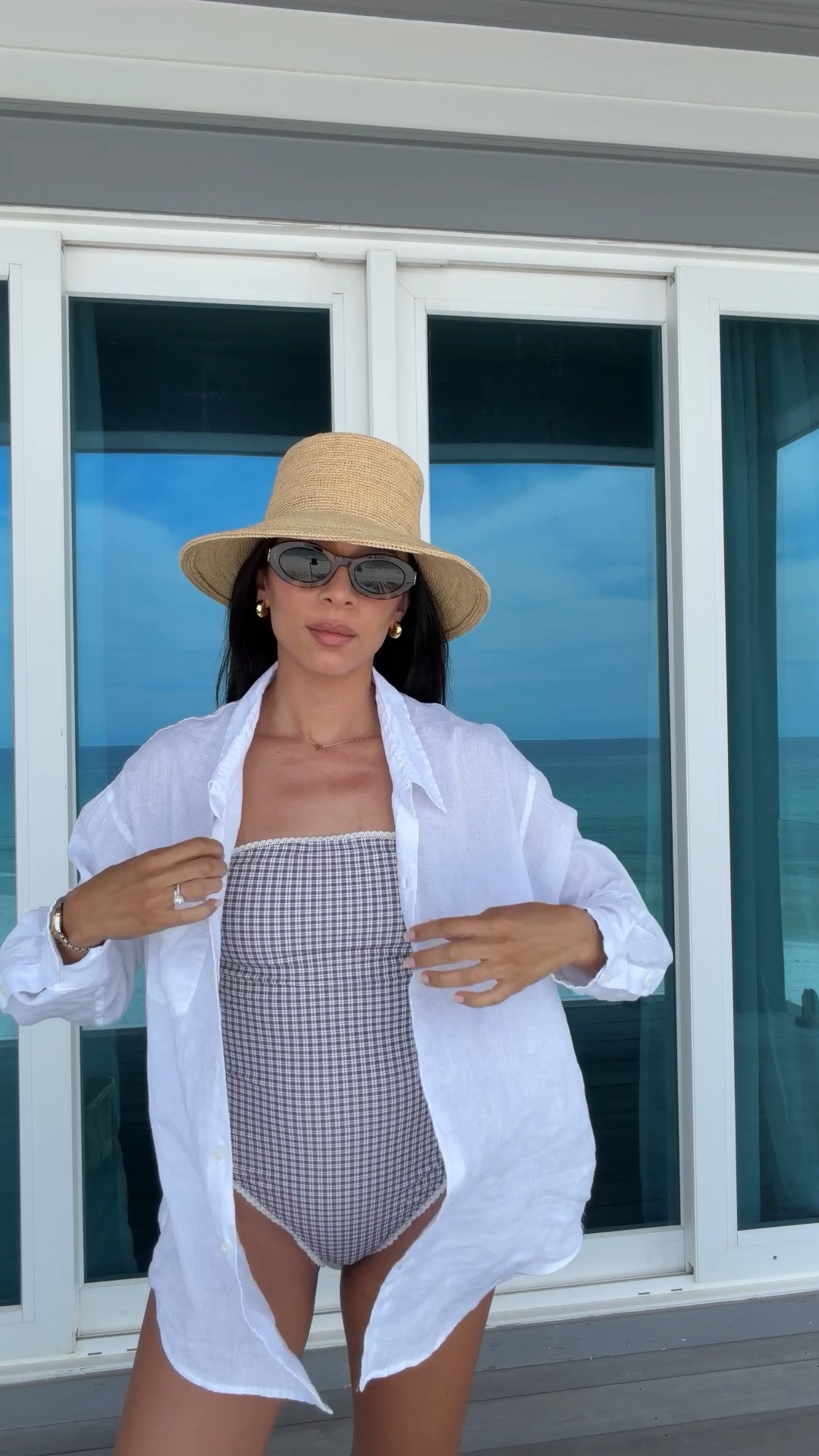 What I’m wearing to the beach on our family vacation! Super flattering one piece swim that’s also modest with my favorite linen button down shirt and raffia bucket hat. These sunglasses and beach bag are pricey but the cost per wear has been almost zero I wear them so much!

#LTKgrwm #LTKootd #LTKSwim