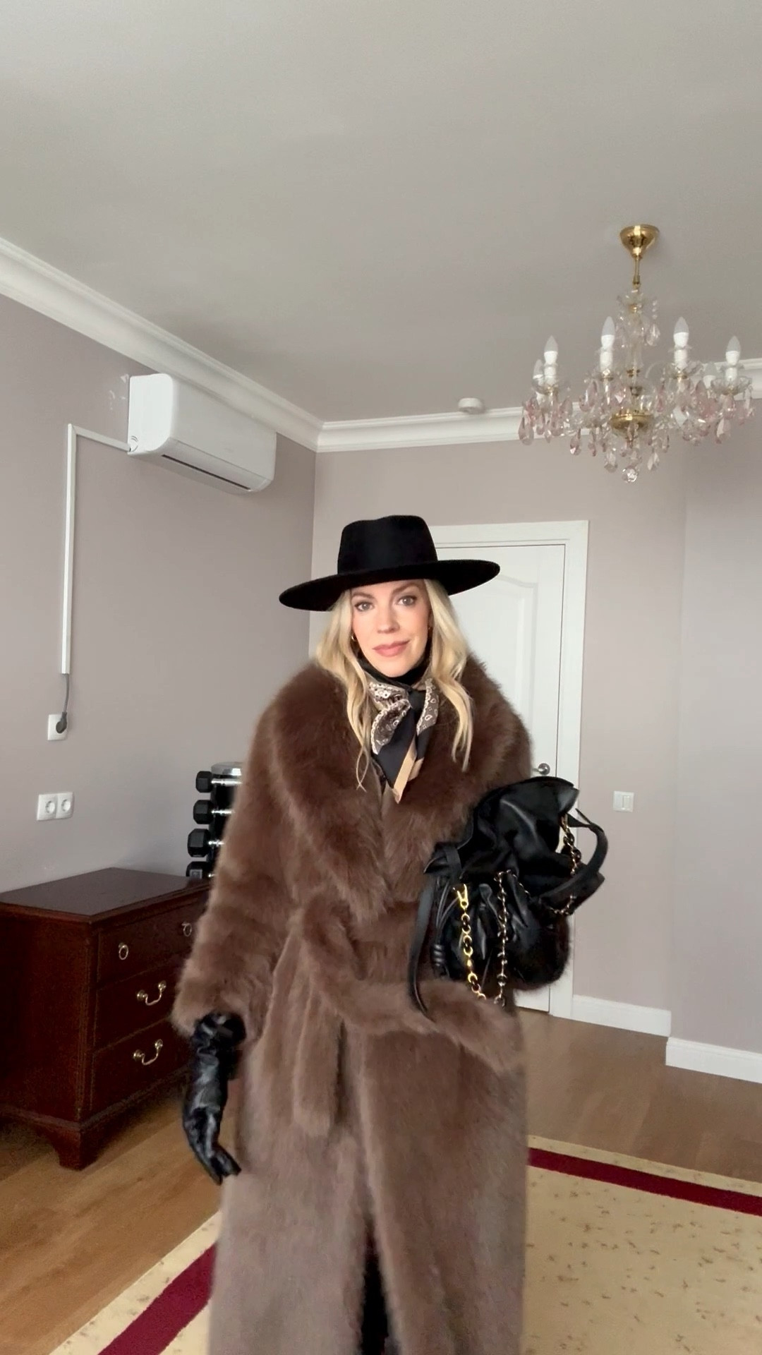 Brown faux fur long coat, @Janessa Leone black wool fedora hat, Max Mara silk scarf, black leather gloves, Loewe Flamenco pouch handbag 

#LTKOver40 #LTKSeasonal #LTKSaleAlert