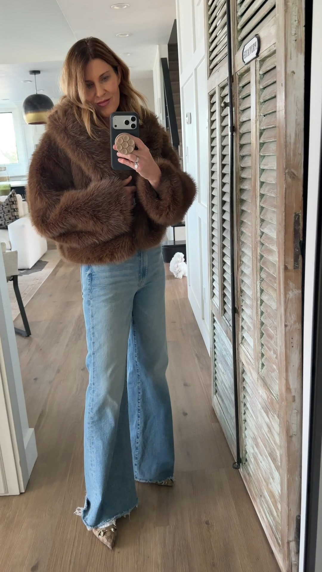 Wearing a small in this cute faux fur 