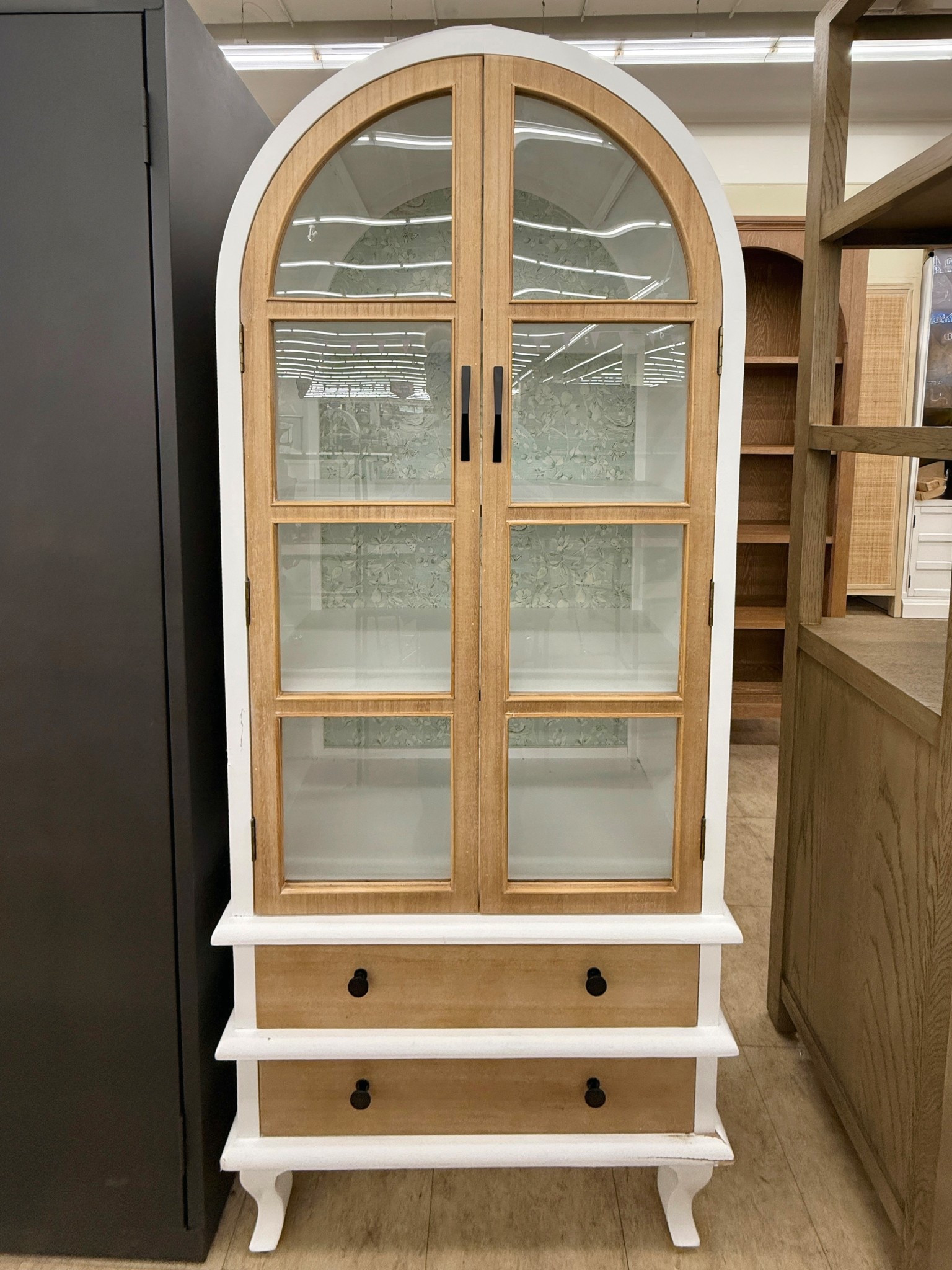 Such a good Wayfair find! 🤍 This Retro Arched Glass Door Bookcase has that perfect vintage-inspired look with the arched top, warm oak tone, and classic glass doors. 🤎 It feels timeless and adds so much character to a space. The solid wood build and roomy shelving make it great for styling books, decor, or collected pieces while still feeling clean and structured. A beautiful piece to anchor a living room or office. Linked it here! ✨ #WayfairFinds #ArchedCabinet #GlassCabinet

#LTKSaleAlert #LTKHome