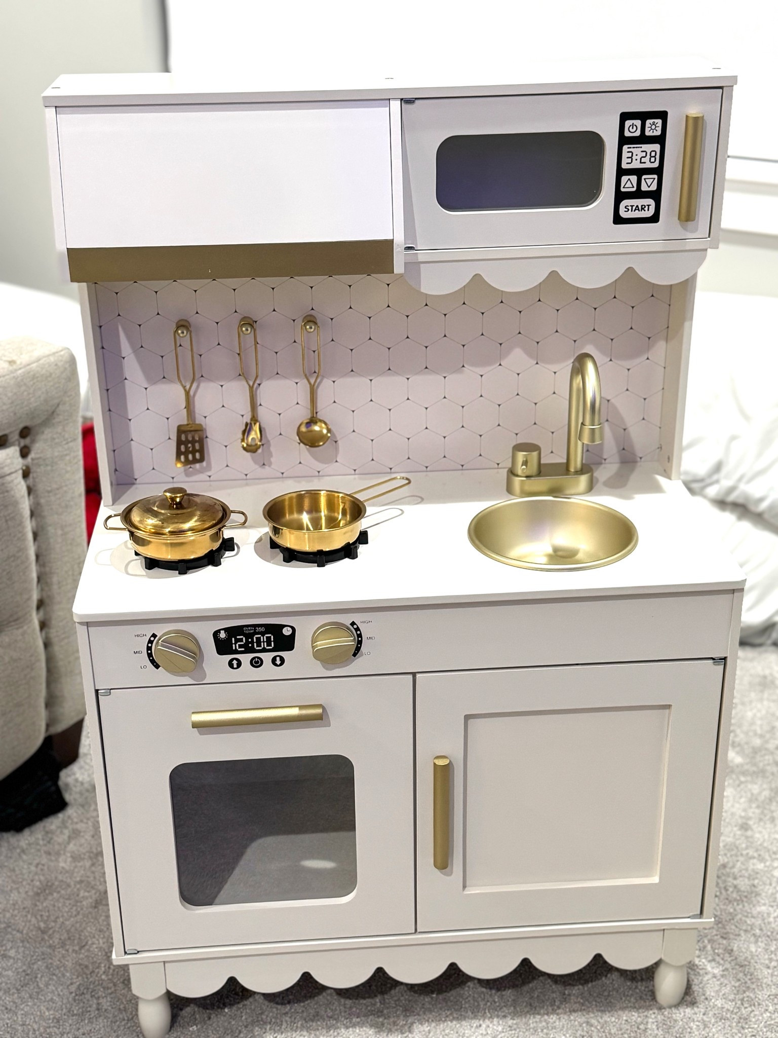 This is THE CUTEST Play kitchen I’ve ever seen, and I cannot believe it’s only $65! The scallops, gold hardware and accessories and the wallpaper! This is THE perfect gift for toddlers! 

#LTKFamily #LTKFindsUnder100 #LTKKids