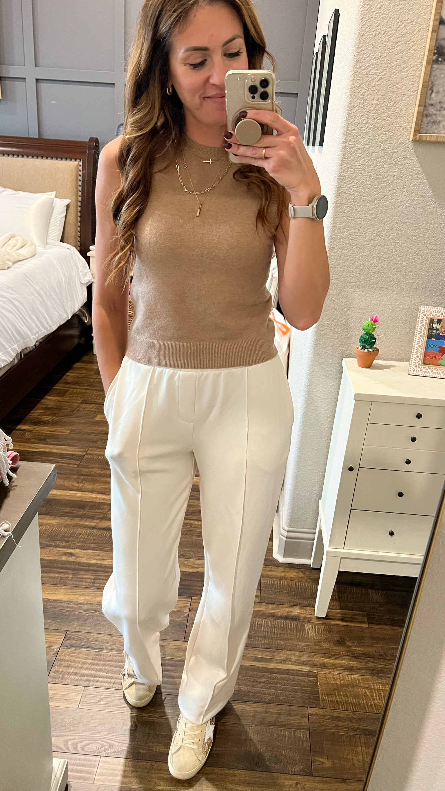 Trying to slide the wardrobe towards fall! These pants are made of athletic material and the quality is amazing. They present like slacks but with an elastic waistband and they’re just buttery perfection. On sale right now! And this sweater tank fit so well with them! Lots of colors in the pants! 

#LTKFitness #LTKFindsUnder50 #LTKWorkwear