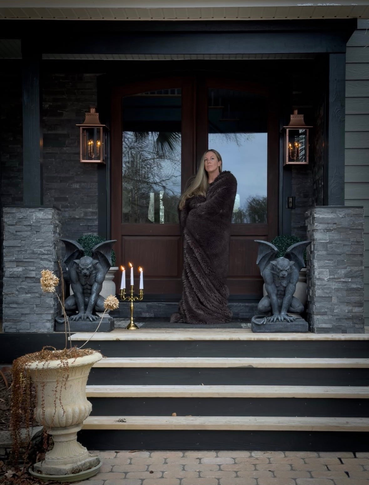 Dark and moody porch decor that leans into drama and atmosphere. Gargoyles add an unexpected, gothic edge, creating a space that feels bold, mysterious, and undeniably unforgettable. 

#MoodyPorch #DarkDecor #GothicDetails #StatementExterior #TimelessStyle #CurbAppeal #HomeDecor #DesignDetails #callsigndesign