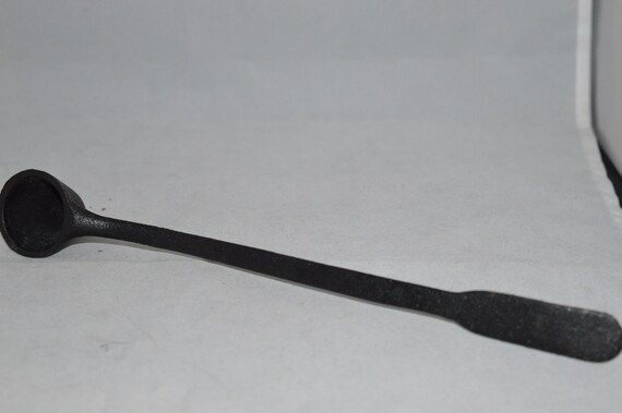 Cast iron candle snuffer / black / 10" long / Excellent condition / cast iron / candle snuffer / ... | Etsy (US)