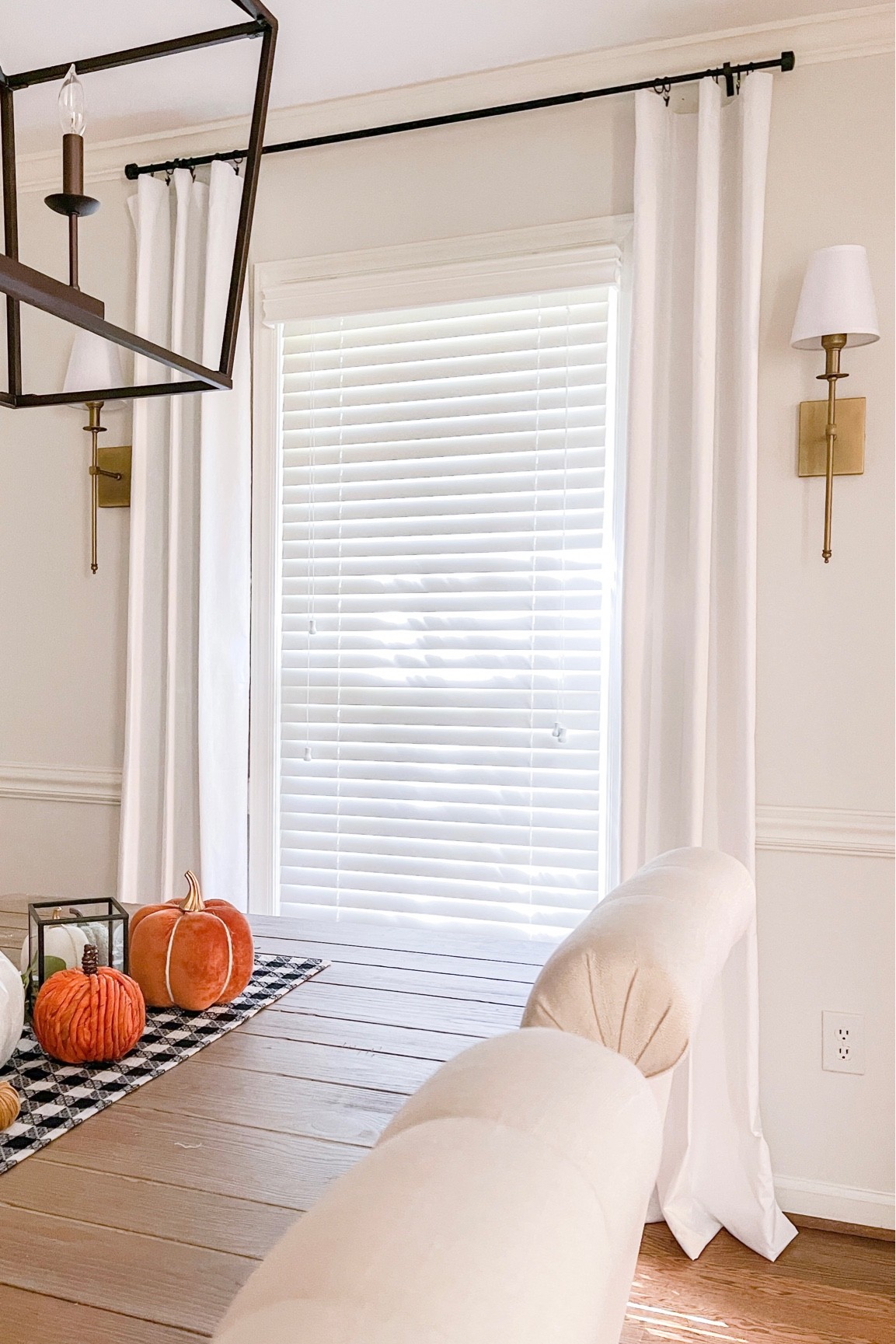 Another project complete. 🎉 Added curtains and sconces to make this wall a little less boring.

Follow me on Instagram @sarahrachelfinke
.
.
.
#curtains #ceilingcurtains #sconces #sconce #diningroom #diningroomdecor #diningroomdesign #diningtable #diningdecor #diningroomideas #diningroomwindow #beforeandafter #beforeafter #renovation #renovations #greensboro #greensboronc #halloweendecor #halloween #halloweendiningroom #falldiningroom

#LTKunder50 #LTKhome #LTKHalloween