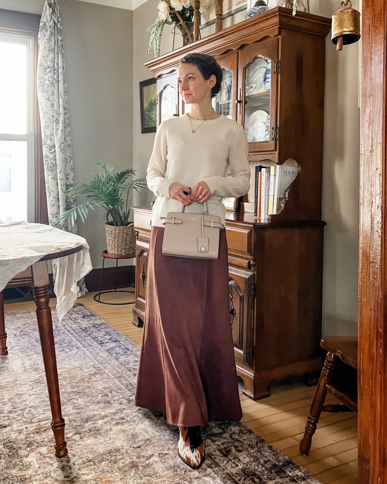 My church outfit today- a cream cashmere sweater from Quince, suede maxi skirt from Chicwish, neutral leather bag from Le Tanneur and calf hair boots from Marc Nolan. 
Petite outfit. Classic outfit. Modest outfit. Winter outfit. 

#LTKSeasonal #LTKOver40 #LTKootd
