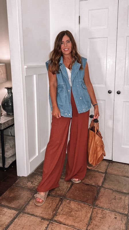 Super cute casual outfit for summer from Amazon

Linen blend high-rise Palazzo pants -wearing my true size medium

Oversized denim vest - I’m wearing a large but could’ve stuck with my true size medium

Look for sandals from target - tts

Oversized, distressed, leather satchel from free people 

Fitted bralette tank from aerie

#LTKOver40 #LTKStyleTip #LTKFindsUnder100