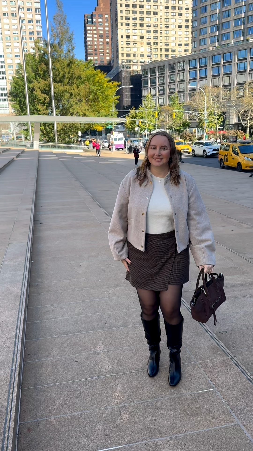 5’2 wearing size large in the plaid skort and size large in sweater top. Bomber jacket is also size large. Amazon wide calf friendly high knee boots. 