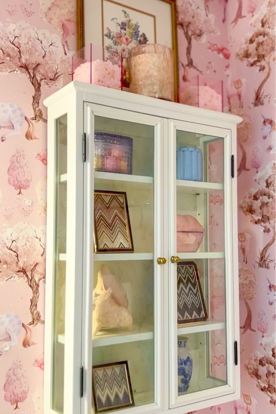 Refresh the styling of this little girls bathroom cabinet with me 💖

#interiordesign #grandmillennialdecor #grandmillennial #njinteriordesign #maximalistinteriors #interiorstyling