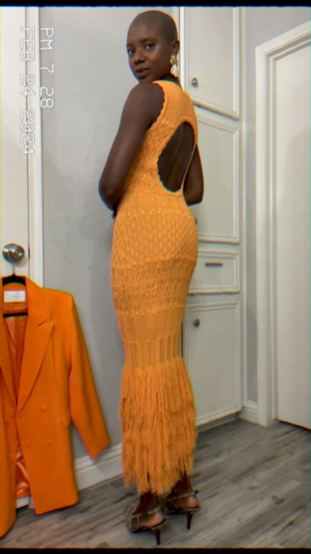 Orange Midi dress with cut out back and fringe bottom. Fully lined and comes in other colors. Runs true to size. Great spring wedding guest dress  

#LTKwedding #LTKfindsunder100 #LTKVideo