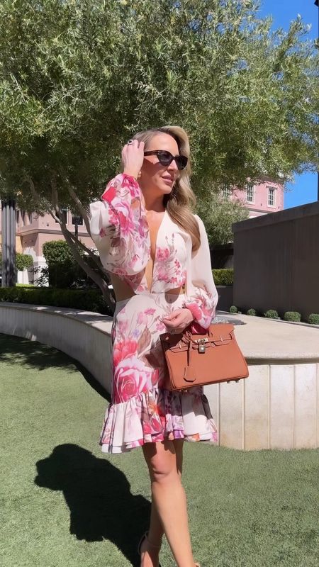 Summer outfit idea: floral mini dress + tan strappy heel sandals + tan bag and some big sunglasses. This summer dress is super sexy so definitely use with double sided
tape 😉 

#LTKVideo #LTKSeasonal #LTKstyletip
