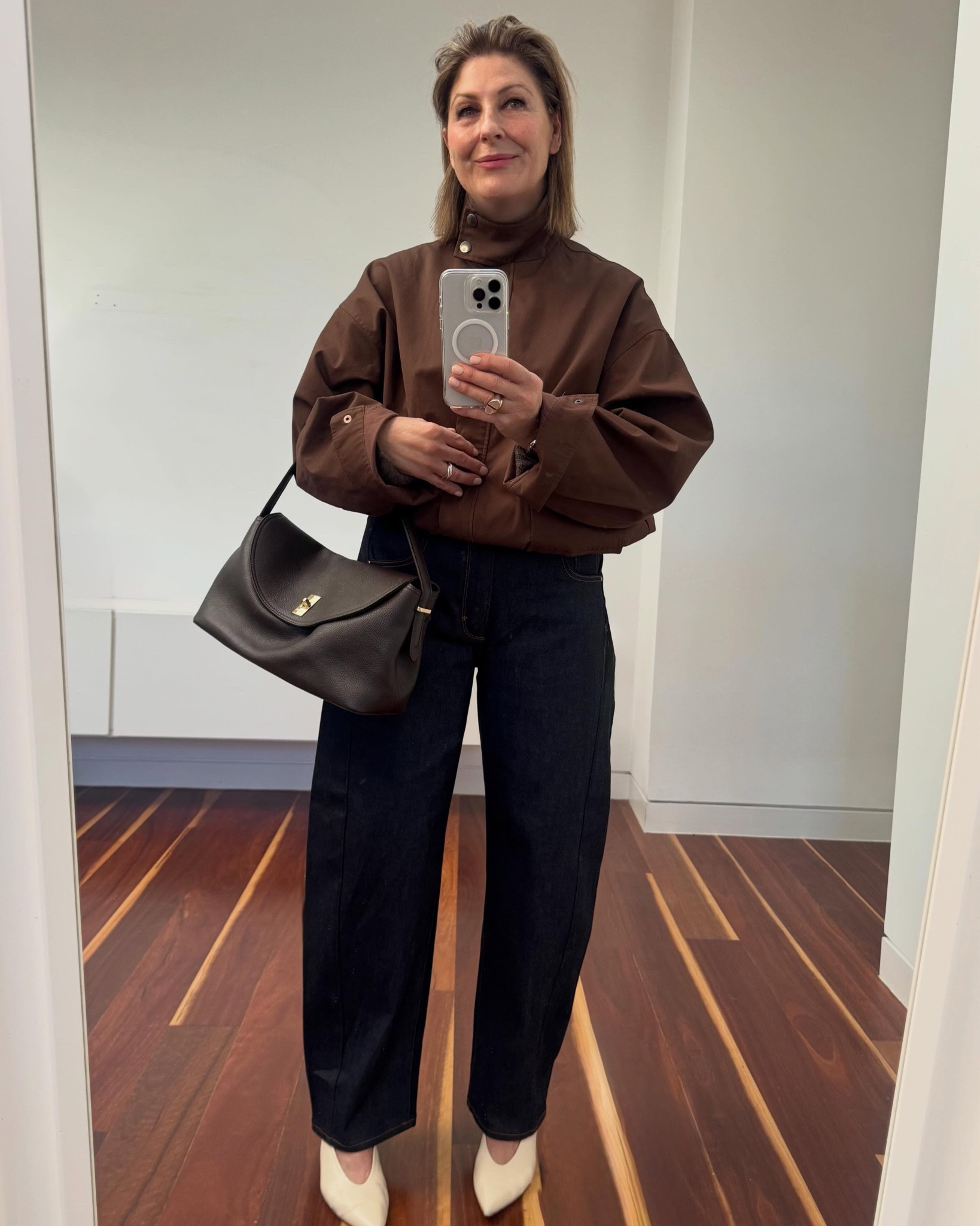Can we talk about this fabulous bag? 
(and all these pieces I really love wearing. On repeat.)

It’s called the Sloane (large) tote cross body in choc brown @shopvestirsi & I love it 😍 
It’s a fabulous rich chocolate colour ✔️
It’s a cool modern shape✔️
It has two different length straps - a shorter shoulder strap or you can wear it long ✔️
It squishes into a slouch style so it looks more casual rather than too “done” & structured ✔️
It’s roomy,  fill with everything (!) but not toooo oversized ✔️ 
100 % leather ✔️
Comes in a smaller size too if you prefer ✔️

 I’m wearing ( links in stories)
* The fabulous dark denim barrel neuw jeans @davidjonesstore in size 30/30 

* Brown bomber jacket @aerelabel , it’s lined so it’s warmer than you think-  in size 12 on sale!

* Brown cashmere knit @assemblylabel - tones in so well with jacket , great cut , in size 12 👉Swipez vous 

* cream kitten Aeyde heels, sooo comfortable @netaporter 

* Cool brown oversized sunglasses @zara

#LTKaustralia #LTKstyletip #LTKover50style