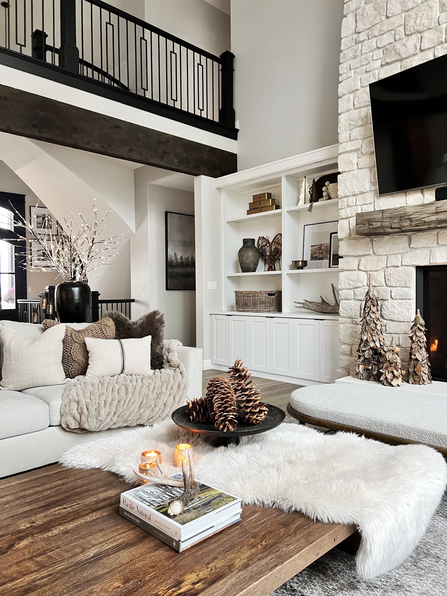 Holiday winter styling has started in my home and I am loving all the cozy vibes. From fur throws to twinkle lights it's all happening! 

#LTKSeasonal #LTKHoliday #LTKhome
