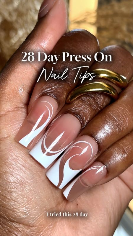 Beginner friendly & lasts 28 days🤯details👇🏾

Comment “need” for links 
TIPS:
1. Use btartbox gel glue and add glue to both sides of the nail and a generous amount at the bottom

2. Apply at a 45 degree angle to avoid bubbles underneath 

3. Make sure placement is right BEFORE you cure! 

4. Cure with a uv light that has like a gooseneck so it’s easier 

5. Use the btartbox builder gel to help with chipping. Make sure to add to the edges! After you cure wipe it with alcohol. This is optional but i find it makes the nails look and last better.


This was my first time using the “gel glue” method and it was much easier than liquid glue because it filled out the bubbles underneath the nail. Also if any got on my fingers it was easy to wipe off unlike liquid glue. These nails are sturdy and beautiful! I looooove how the nude is brown girl friendly and this pack comes with 5 different designs. 💕💕 

They are said to last past 28 days 🤯!! It’s important to make sure you prep your nails properly and apply them. Prepping includes removing your cuticles, filing your nails applying dehydrator. 


#LTKVideo #LTKfindsunder50 #LTKbeauty