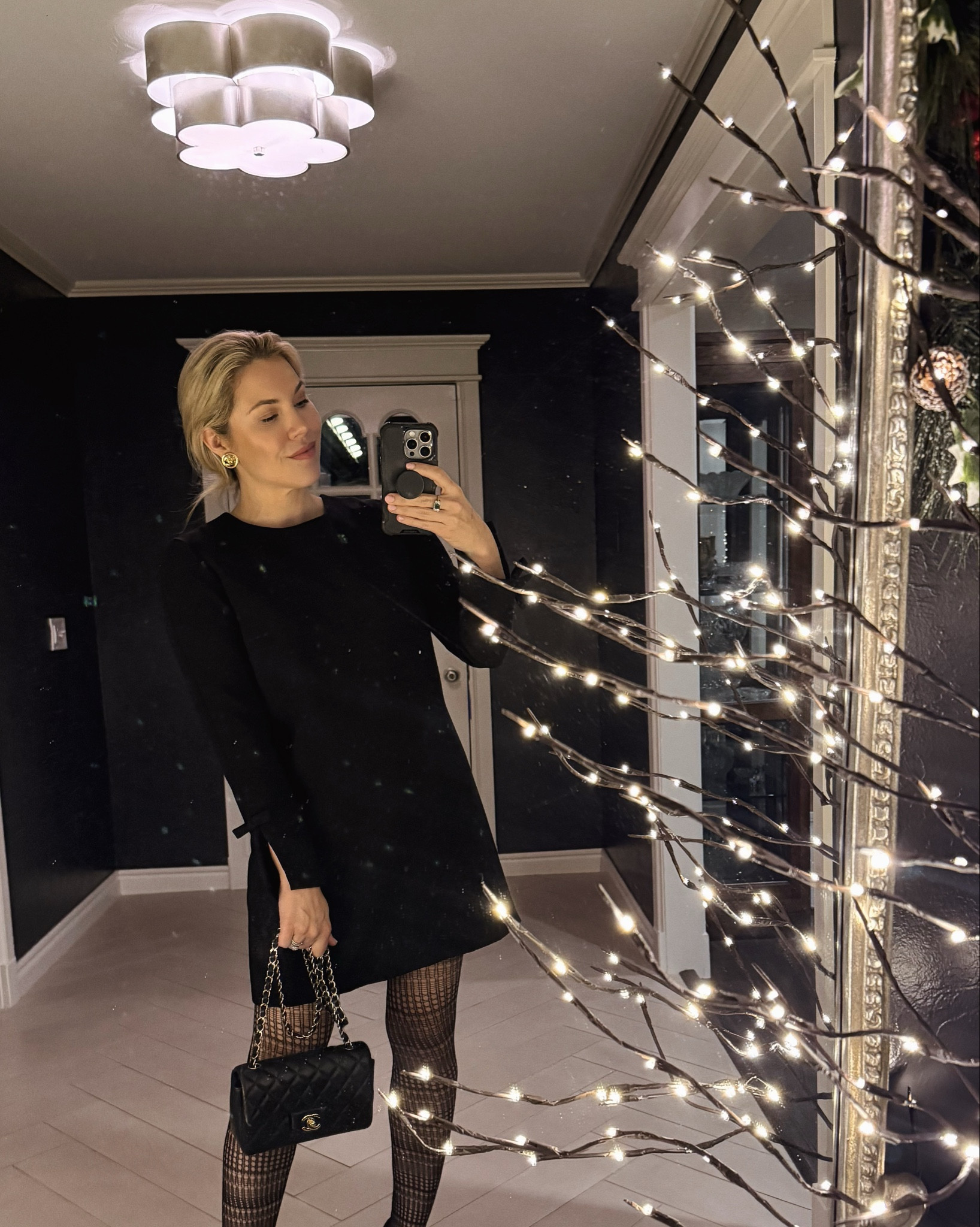 A simple black dress with bows details on back and sleeves 

#LTKHoliday #LTKSaleAlert