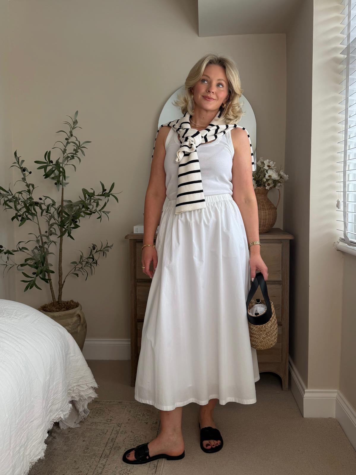 Midi Skirt Outfit Ideas! 

White Tank Top, White Midi Skirt, Striped Knit Jumper, Neutral Summer Outfit, Capsule Wardrobe, Minimal Holiday Look, Effortless Day Outfit, Classic European Summer, Chic Casual Style.

#LTKsummer #LTKspring #LTKuk