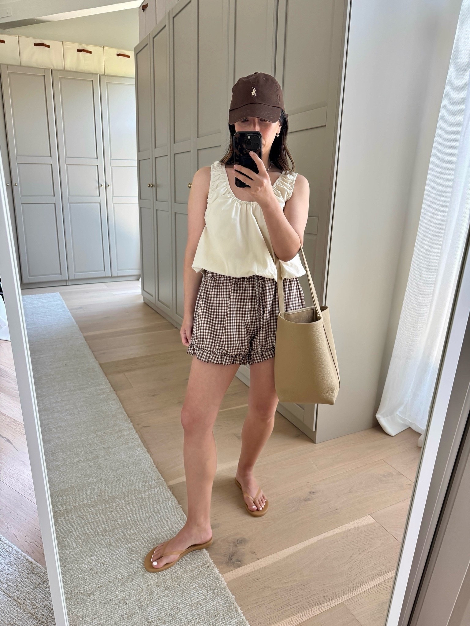 easy summer outfit to beat the heat ☁️

Zara tank small 
Posse shorts large - run very small 
Tkee sandals 5 
The Row bag medium
Polo Ralph Lauren hat 
Electric Picks earrings 
Dorsey James necklace 15”

summer outfits, summer style, petite style

#LTKmomlife #LTKootd #LTKPetite