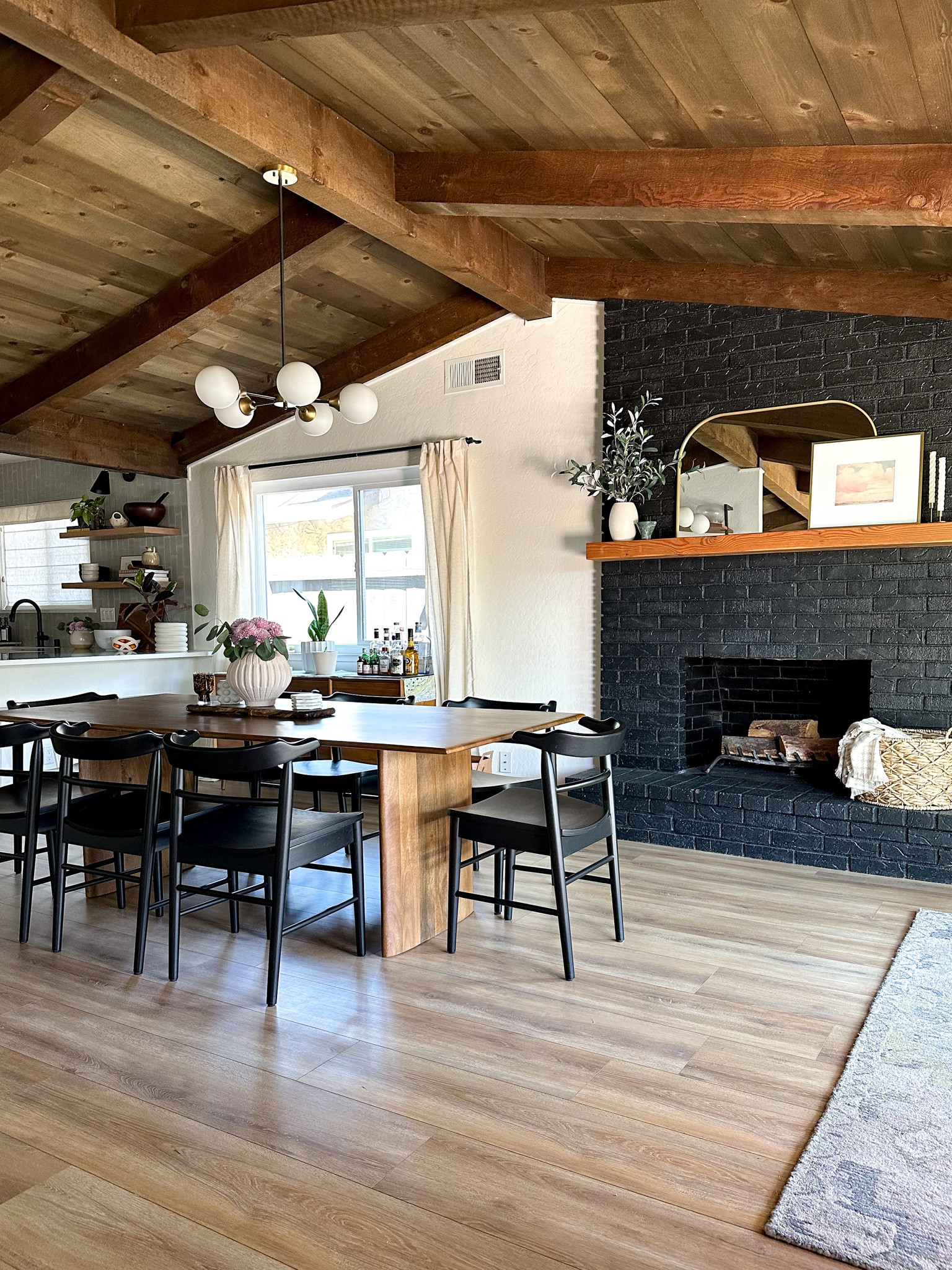 Our dining room mix of high and low. West elm dining table, black dining chairs  

#LTKstyletip #LTKSeasonal #LTKhome