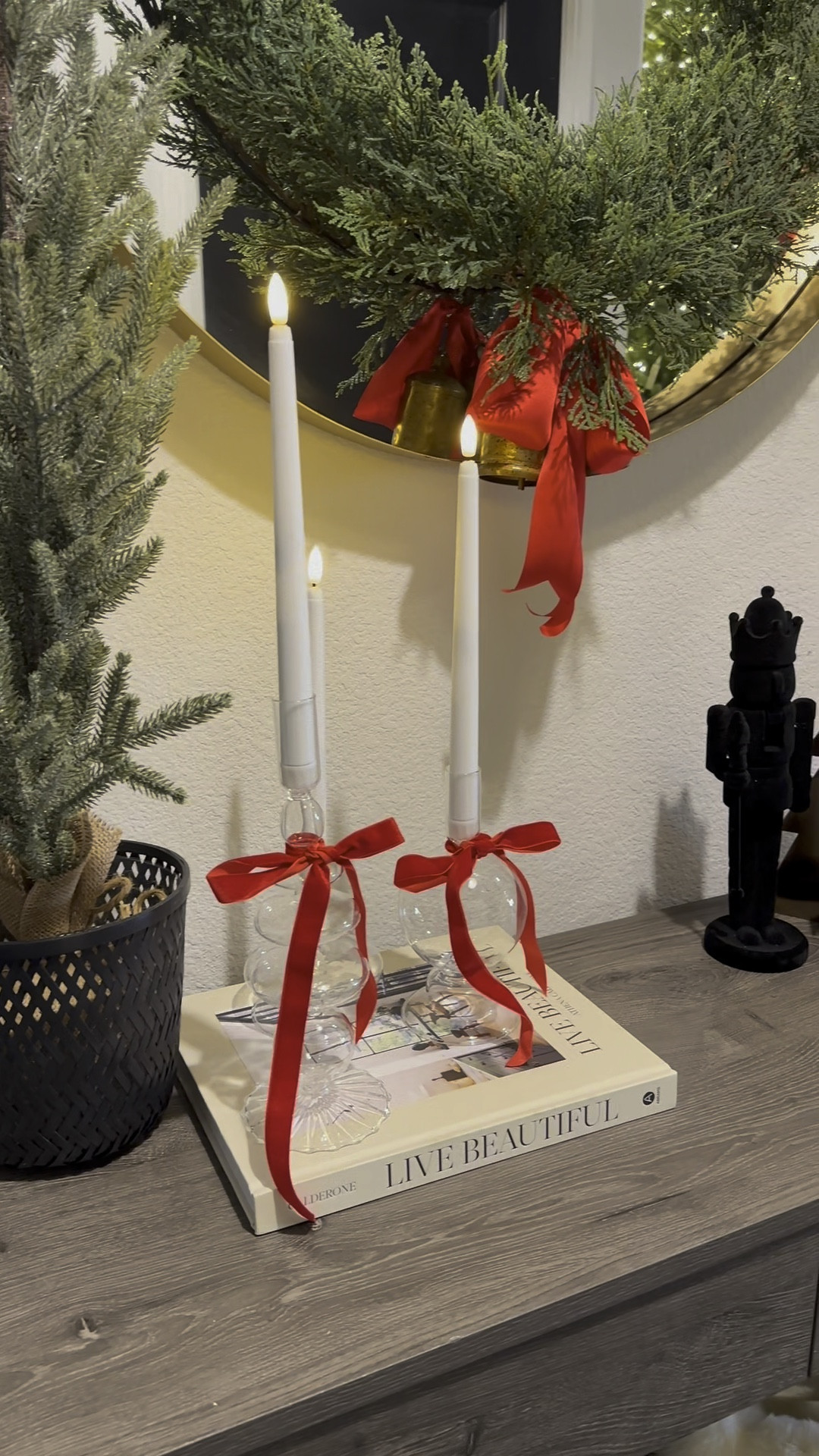 Christmas entryway, Christmas decor, red Christmas, console table, wreath, modern nutcracker, clear candle holders, faux candles, modern Christmas decor 

#LTKHome #LTKHoliday #LTKStyleTip