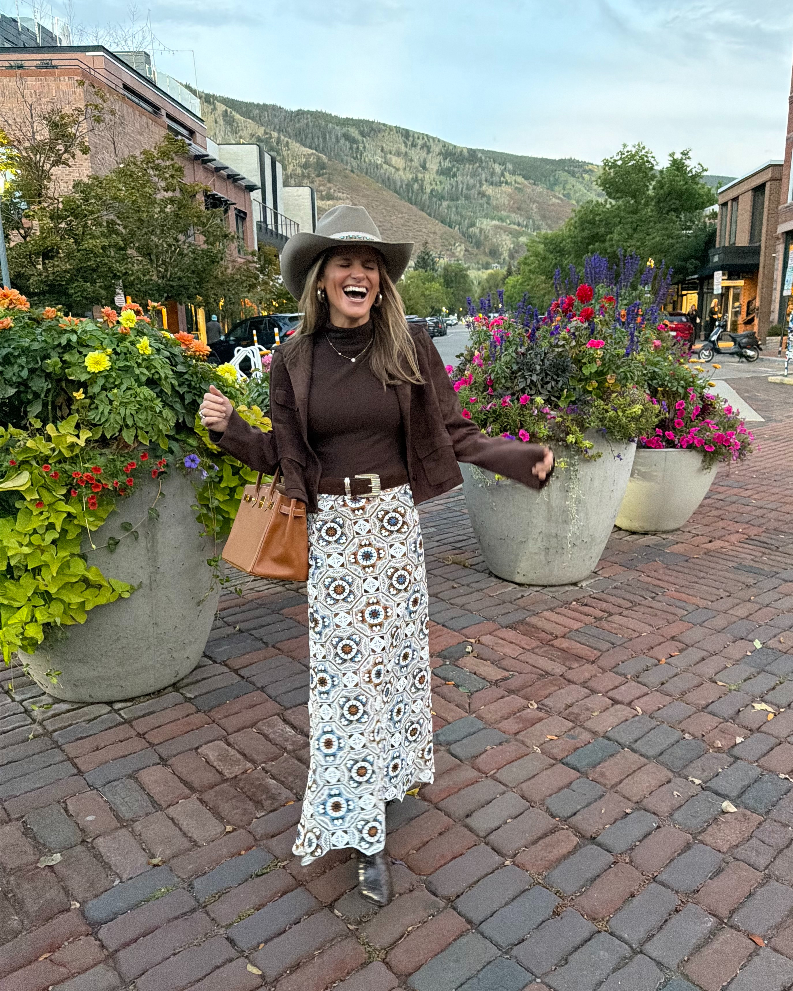 Crochet maxi crochet skirt in fall colors! Reformation turtleneck tank and ruti cropped suede jacket. Schutz croc embossed boots.  

 #LTKootd