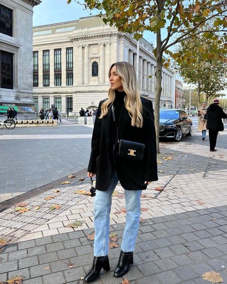 It's no secret that celine have really been killing it this year with their triomphe line. You should see how much of it is on my wishlist! I've taken two of their pieces to elevate this simple, classic look. I've gone with an oversized blazer, black cashmere roll neck, blue mom jeans. + heeled boots.

#LTKeurope #LTKSeasonal #LTKstyletip