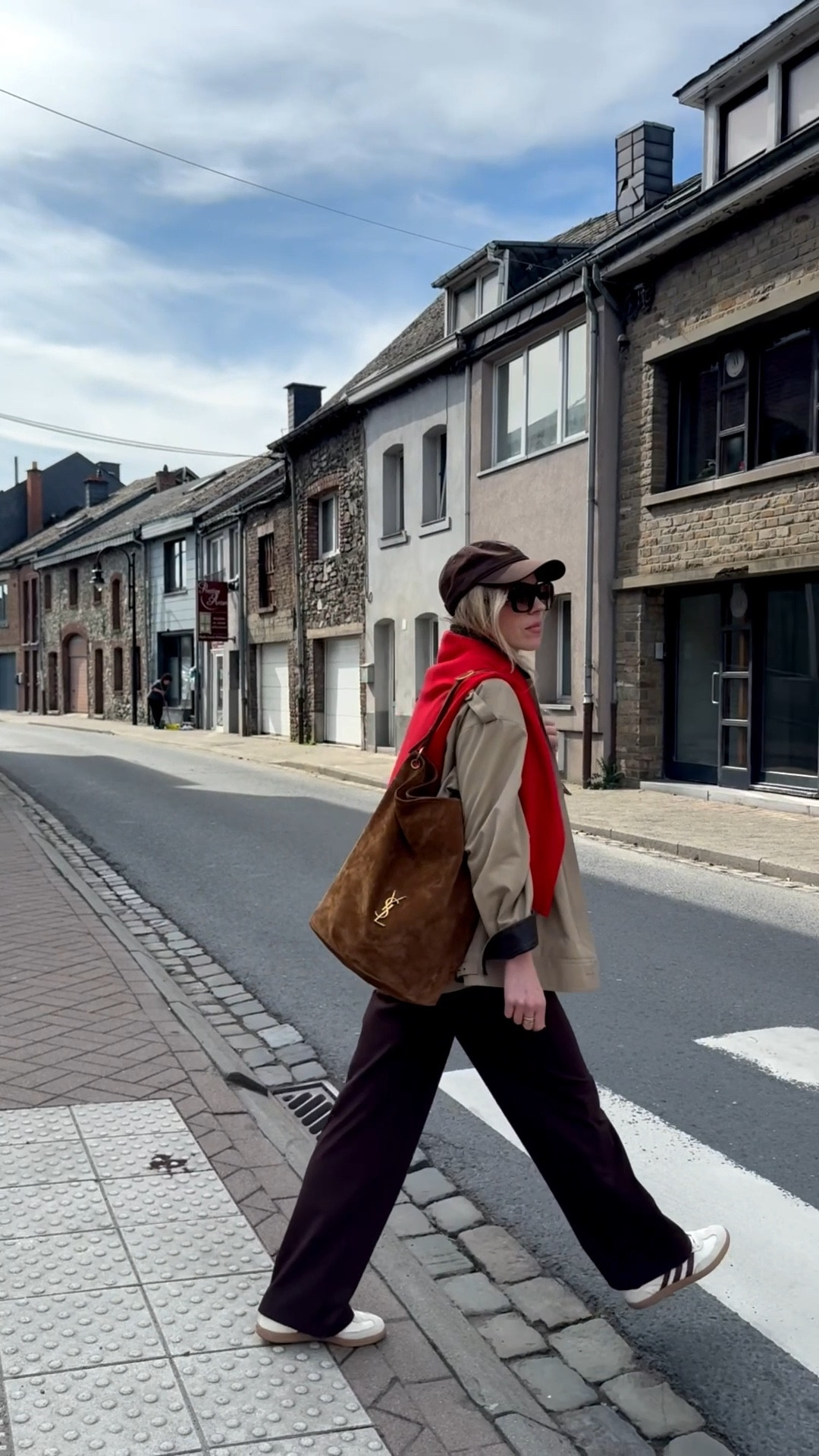 European vacation look, trench coat, chocolate brown jogger pants, suede YSL bucket bag, chocolate brown and red outfit 

#LTKOver40 #LTKTravel #LTKSaleAlert