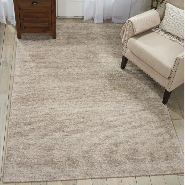 Zendejas Solid Oatmeal Beige Area Rug | Wayfair North America