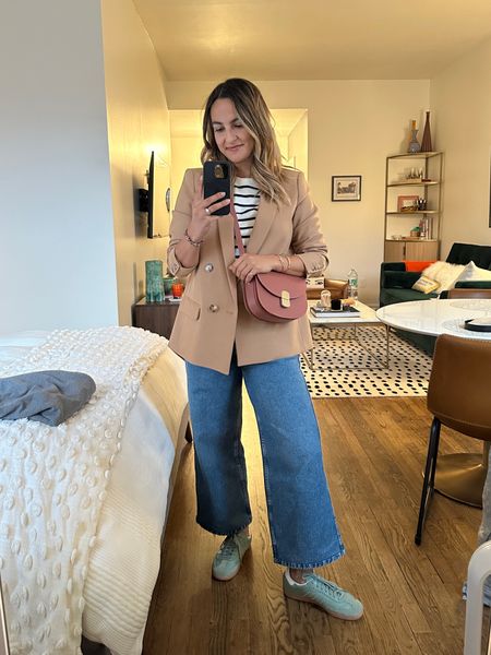 Easy but elevated fall outfit. Thai is a great option to feel casual but still put together, or for a casual Friday at work.

Blazer
Striped tee
Wide leg jeans 
Sneakers
Structured bag

Fall outfits, fall fashion, sezane, French fashion, minimal style, blazer outfit idea 

#LTKstyletip #LTKworkwear #LTKshoecrush