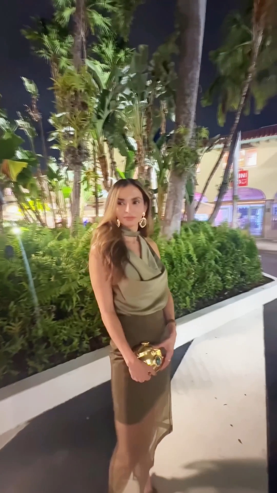 Elegant, modern, and effortlessly chic — this look is all about luxe textures and golden tones. The satin-draped top and tailored skirt create that perfect balance of sophistication with a hint of allure. Styled with metallic heels and a structured clutch for the ultimate evening statement.

Save this look for your next dinner or night-out inspo — refined, radiant, and quietly luxurious. 

#LTKParties #LTKHoliday #LTKStyleTip