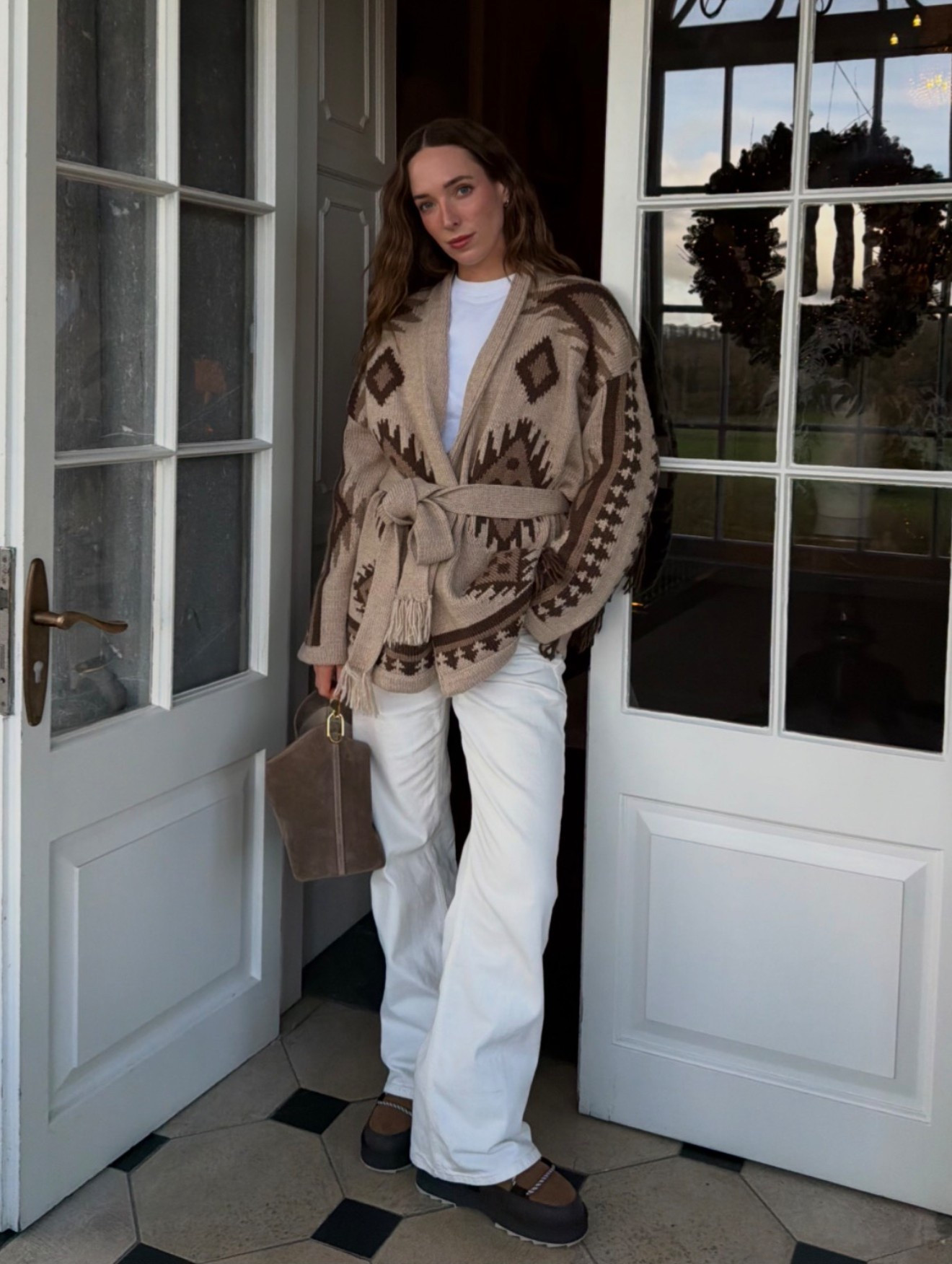 Current obsession: cosy fringed wrapped cardigans 🤎 Linking this one and some of my other favourites belolink

#LTKeurope #LTKfestive #LTKwinter