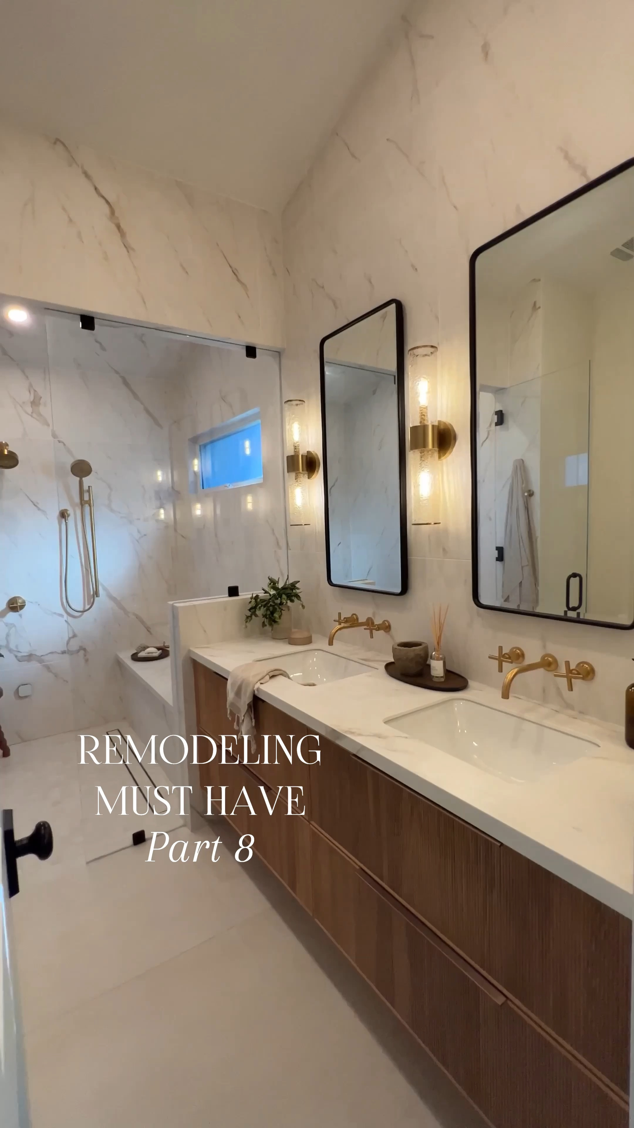 Remodeling must have. We used a pony wall to hide this niche.

I've had lots of requests from people to recreate this bathroom because it's such an affordable look to achieve this high end design. These are large format tiles and give such a huge impact to a bathroom.
Also linked similar looks for less options for the other finishes.

Bathroom design marble tile porcelain marble tile medicine cabinet brass glass sconces with Vanity

#LTKFindsUnder100 #LTKSaleAlert #LTKHome