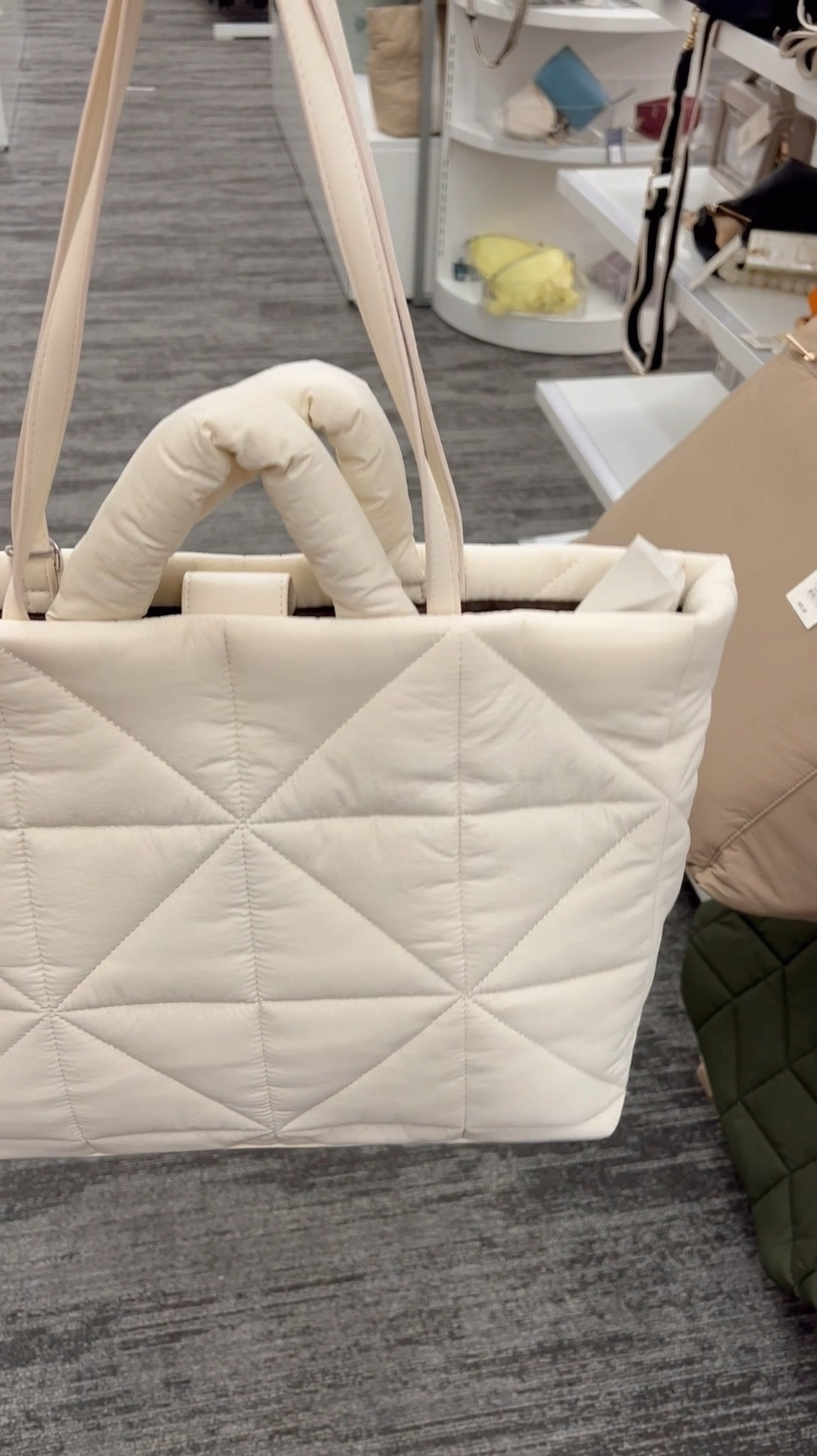 Viral tote bag that looks designer. I love the quilted look & puff handle. I’m going to be using this for my traveling bag and to take to church. 

#LTKItBag #LTKStyleTip #LTKFindsUnder100