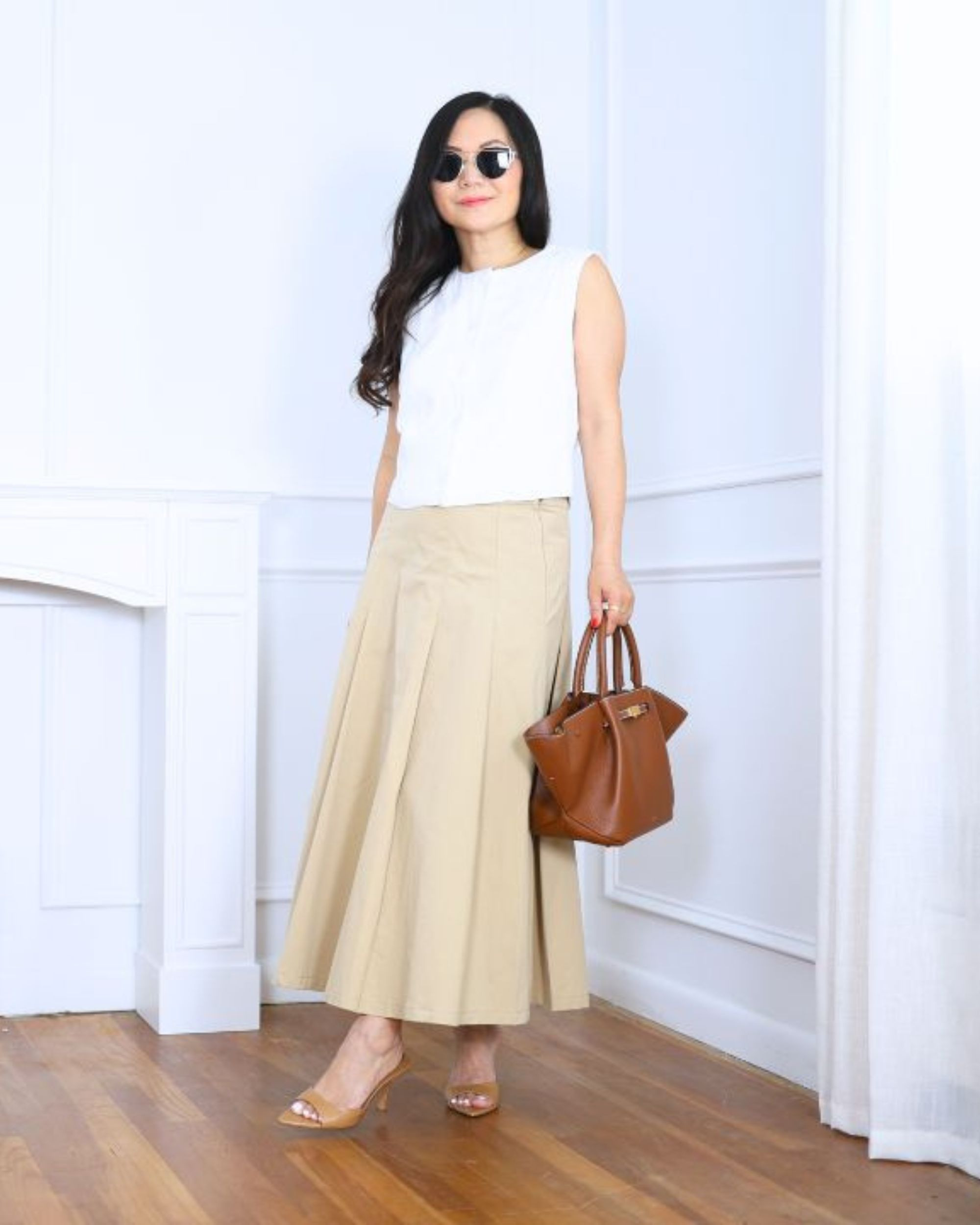 This linen blend vest from Abercrombie (S) paired with a pleated skirt from Mango (S) is such a breezy combo. I added my go-to tote and heels to dress it up a bit. Loving how flattering it feels for my 5’2” frame!

#LTKOver40 #LTKPetite #LTKStyleTip