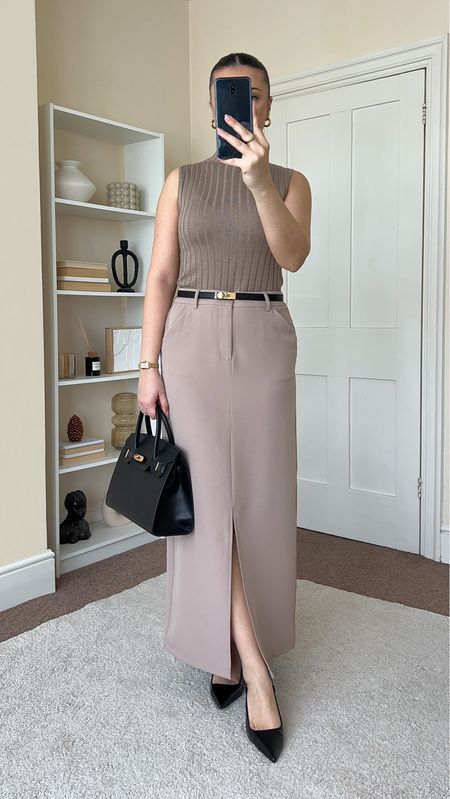 Classy and chic Spring workwear outfit. Top is from Lily Silk, wearing size S. Skirt is from Asos, wearing size M. 

#LTKstyletip #LTKworkwear #LTKspring