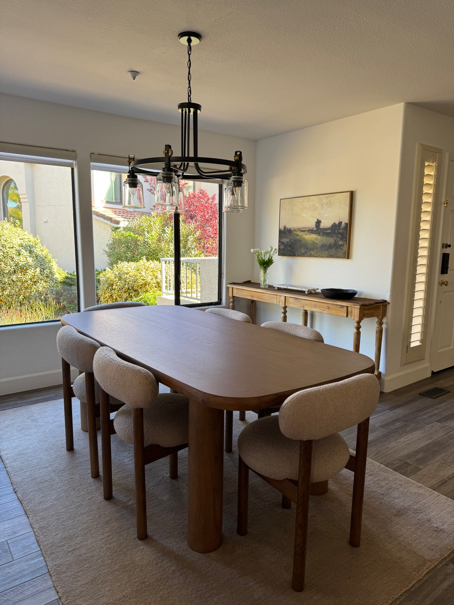 Article dining table, Boucle chairs, Boucle dining chairs, brown rug, brown home decor, faux tulips. 

#LTKSpringSale #LTKHome