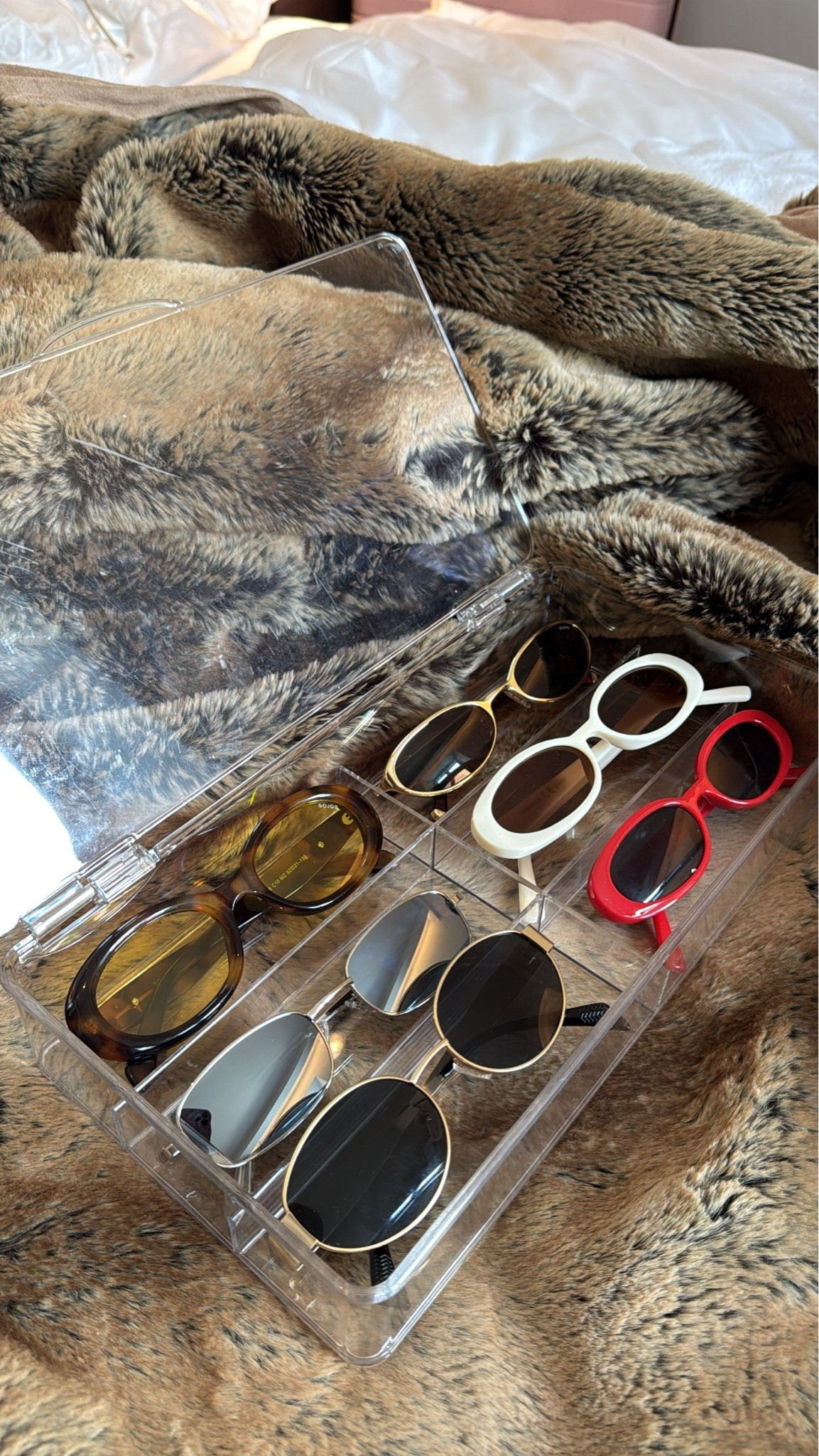 Affordable sunglasses and acrylic traveling case! Keep all of your sunnies scratch free while traveling!!

#LTKTravel