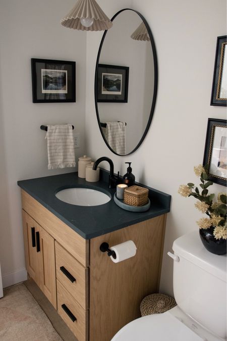 This isn’t a large bathroom, but it sure is cozy!

Save this for future reference!

A few of my favorite features in here…

+ The white oak vanity
+ Soapstone countertop
+ The pretty fluted pendant
+ The mini vintage rug
+ Classic subway tiled shower

#bathroomdecor #bathroomdesign #primarybathroom #bathroomsofinstagram #bathroomstyle #bathroomorganization #bathroomgoals #forthehome #modernorganic #prettylittleinteriors #ltkhome #timelessinteriors 

#LTKstyletip #LTKfindsunder50 #LTKhome