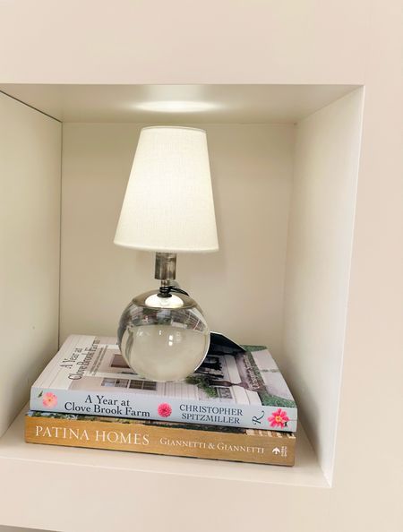 This adorable table lamp really lights up the bookshelf elegantly. 

#LTKHome