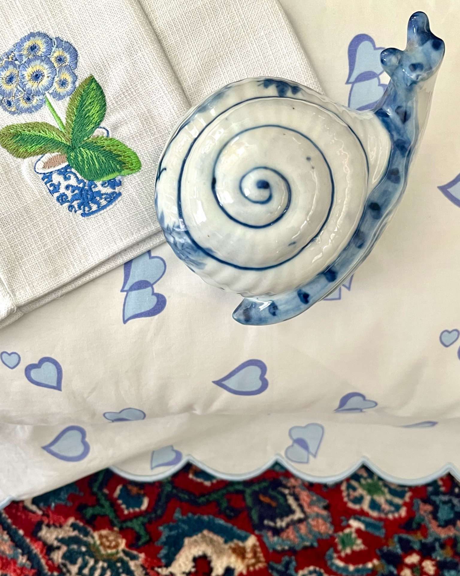 Give me all the pretty blue and white - how about you? Love this tissue box cover with the embroidered primrose in a blue and white cachepot mixed with a Schweitzer Lovable 21 boudoir sham (style tip - a boudoir sham is the perfect way to add a small bed linen splurge) and this vintage blue and white snail piggy bank. 

#LTKfindsunder50 #LTKstyletip #LTKhome
