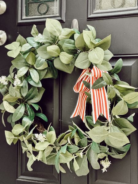 Simple patriotic decor with a green wreath and a red striped ribbon. 

#LTKSeasonal #LTKFindsUnder50 #LTKHome