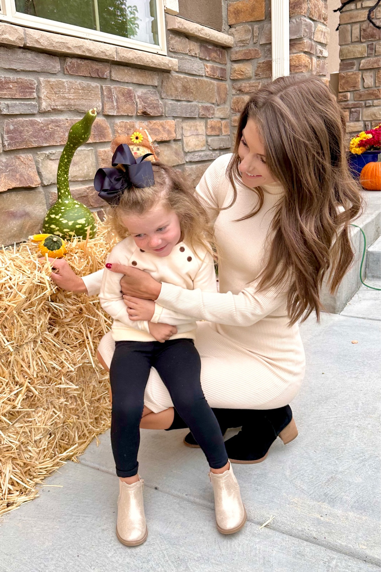 Mom-and-daughter moment! We love our matching neutral sweaters and Fall booties! 

#ShoptheLook #FallOutfitInspo #FamilyPhotoshootIdeas #KidsFallOutfits

#LTKfamily #LTKstyletip #LTKSeasonal
